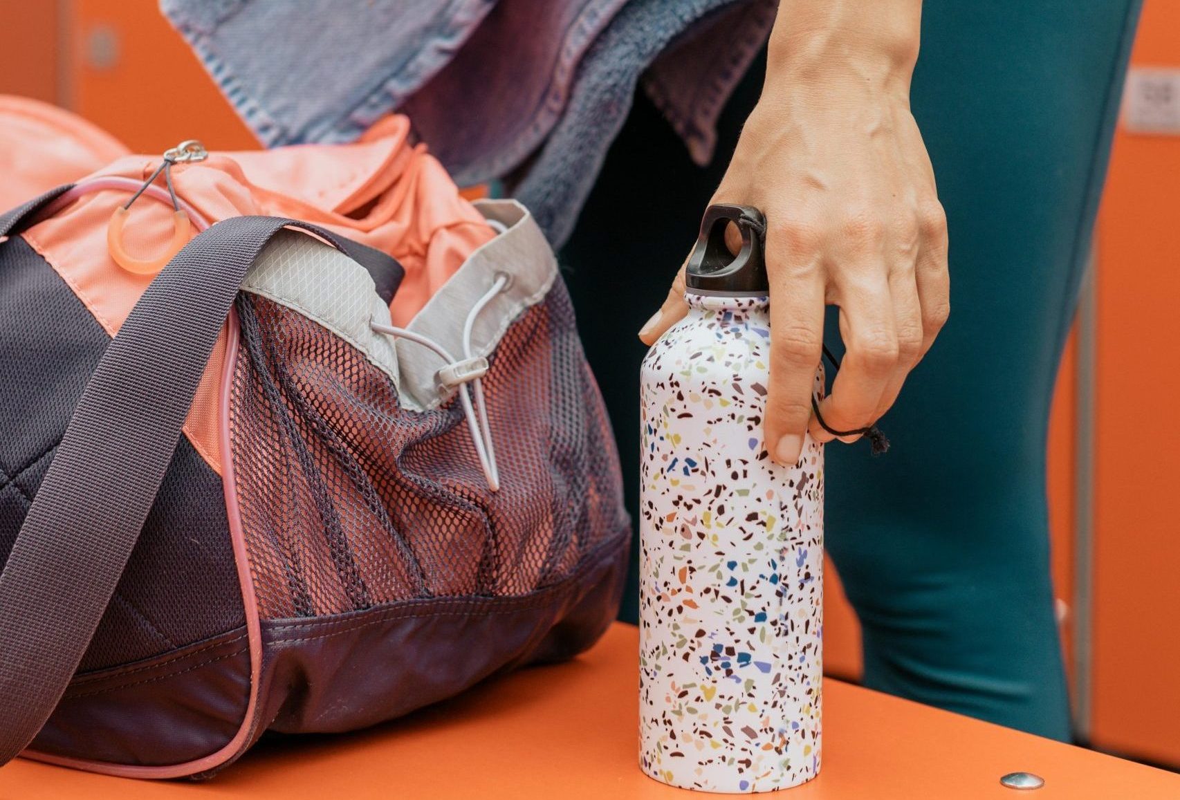 Woman Holding a Tumbler